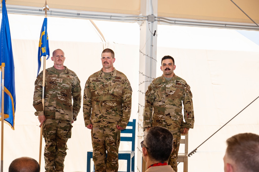 U.S. Air Force Brig. Gen. Quaid Quadri relinquished command of the 378th Air Expeditionary Wing to Col. Seth Spanier during a change of command ceremony at an undisclosed location, in the Central Command area of responsibility, April 6, 2024. Spanier served as the 7th Bomb Wing Commander out of Dyess Air Force Base and has been selected to lead the second rotation under the new Expeditionary Air Base model. The new XAB model shifts the construct of Air Expeditionary Wings from all active, reserve and guard components into force elements centered upon Mission Generation, Command and Control, and the establishment of an operating base. (U.S. Air Force courtesy photo)