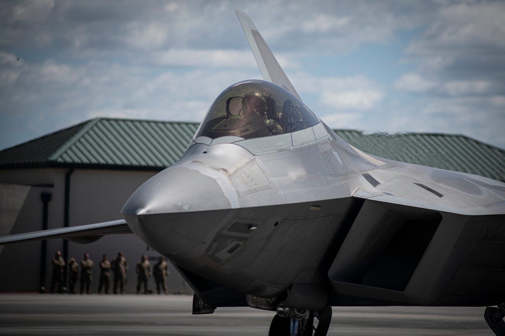 A U.S. Air Force pilot assigned to the 149th Fighter Squadron, Virginia Air National Guard, prepares for take off in an F-22 Raptor