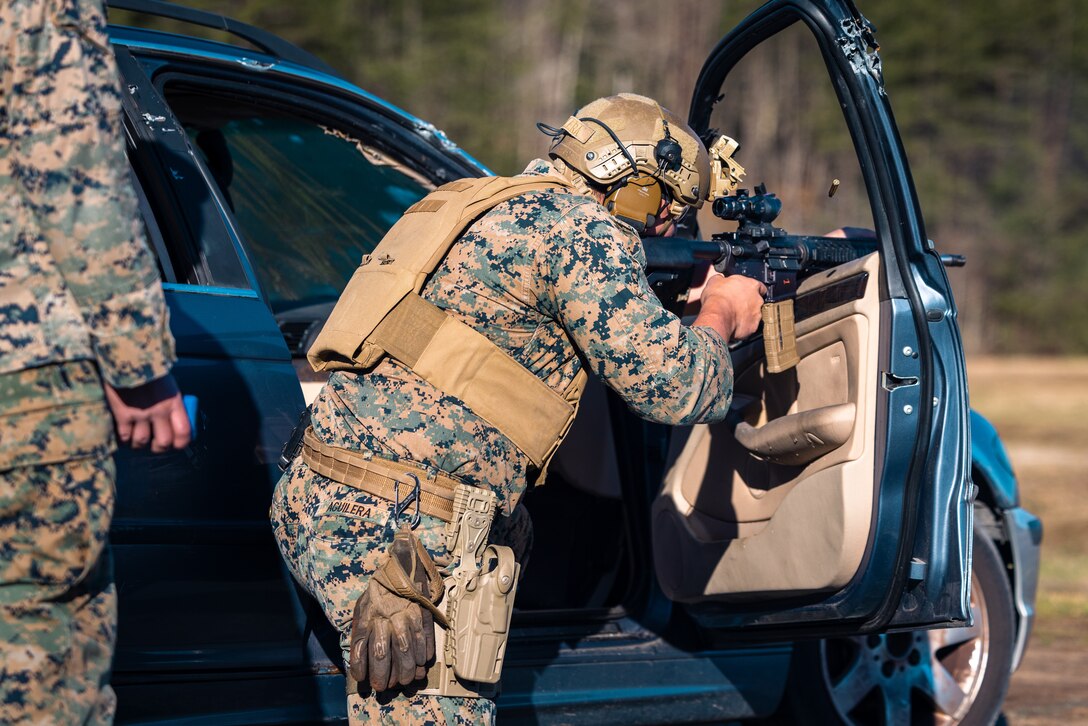 U.S. Marine Corps Sgt. Thomas Aguilera, a combat instructor with School of Infantry West, participates in a shooting drill during the Marine Corps Marksmanship Competition Matches at Weapons Training Battalion on Marine Corps Base Quantico, Virginia, April 5, 2024. The best competitors of the six regional MCMCs compete in various shooting disciplines at the championship matches. (U.S. Marine Corps photo by Lance Cpl. Joaquin Dela Torre)