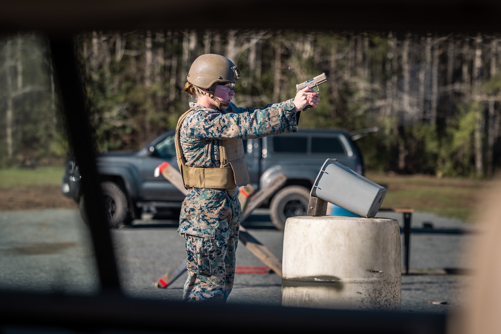 U.S. Marine Corps Cpl. Maddison Delgado Llamas, a helicopter crew chief with Marine Light Attack Helicopter Squadron 169, 3rd Marine Aircraft Wing, participates in a shooting drill during the Marine Corps Marksmanship Competition Matches at Weapons Training Battalion on Marine Corps Base Quantico, Virginia, April 5, 2024. The best competitors of the six regional MCMCs compete in various shooting disciplines at the championship matches. (U.S. Marine Corps photo by Lance Cpl. Joaquin Dela Torre)