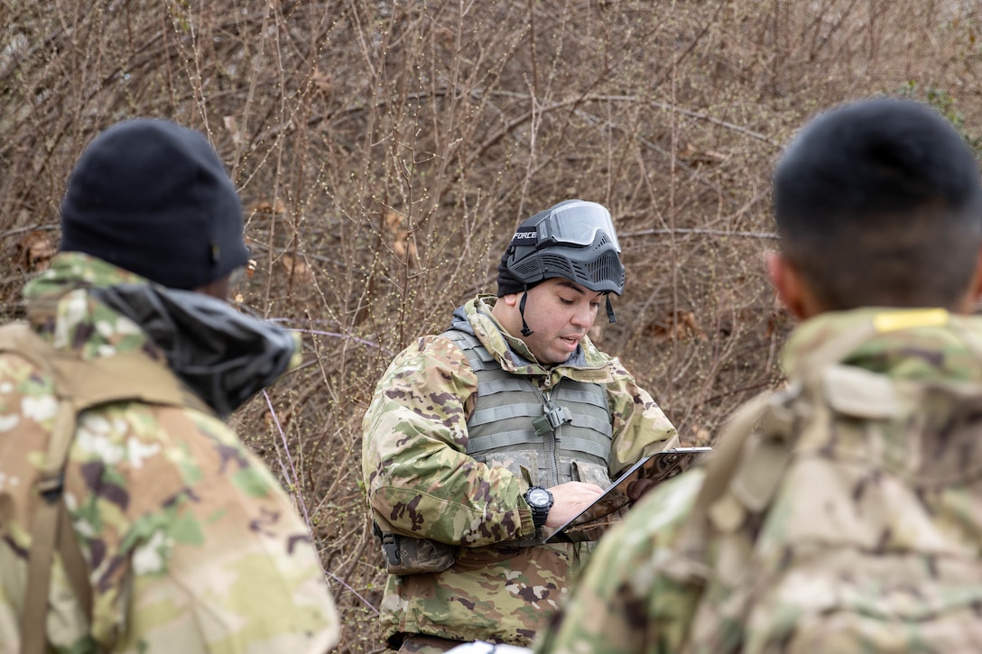 Kentucky Army National Guard officer candidate shares troop leading procedures with a mix of officer candidates and Ecuadorian military cadets at Wendell H. Ford Regional Training Center, Greenville, Kentucky, Feb. 28, 2024.