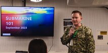U.S. Navy Capt. Bill Dull, Deputy Branch Head for Strategic Systems Program's (SSP) Weapons, Systems, Operation, Evaluation and Training delivers a presentation on the facets of SSP's submarine-based flight-testing program to distinguished visitors and guests aboard the Arleigh Burke-class guided-missile destroyer USS Halsey (DDG 97) off the coast of San Diego, California, Wednesday. USS Halsey participated as a support vessel in the Demonstration and Shakedown Operation (DASO 32) for the Ohio-class ballistic missile submarine USS Louisiana (SSBN 743). The primary objective of DASO is to evaluate and demonstrate the readiness of the SSBN’s Strategic Weapon System (SWS) and crew before operational deployment following the submarine’s engineered refueling overhaul. DASO-32 is the final DASO conducted by an Ohio-class SSBN coming out of engineering refueling overhaul (ERO), marking the completion of all post-ERO DASOs for the Ohio-class SSBNs. The Trident II D5LE strategic weapon system is the system that will provide the initial SWS capability for the Columbia-class SSBN.