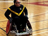 Sgt. 1st Class Saull Sierra during a warm-up at the 2024 Wheelchair Rigby Camp at Fort Belvoir.