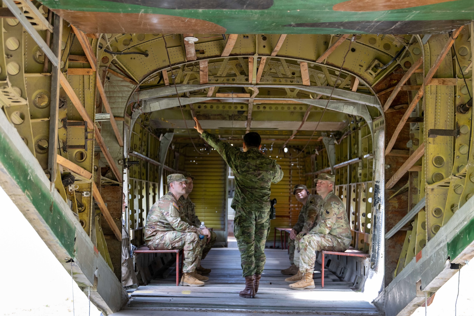 Capt. Israel Nivelo of the Ecuadorian Army speaks with KYARNG Soldiers about Ecuadorian Army paratroopers during a subject matter expert exchange in Latacunga, Ecuador, March 18, 2024.