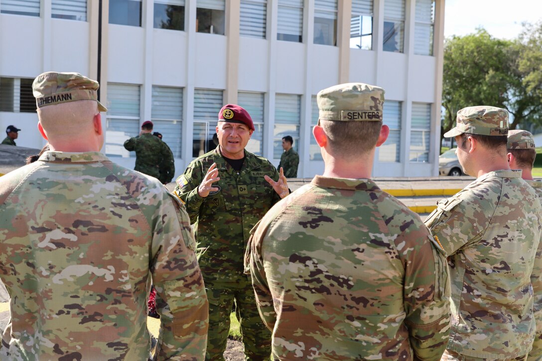 Ecuadorian Army Col. Gustavo Iturralde, commander of Ecuador's 9th Special Forces Brigade, talks with Kentucky Army National Guard in Latacunga, Ecuador, March 18, 2024.