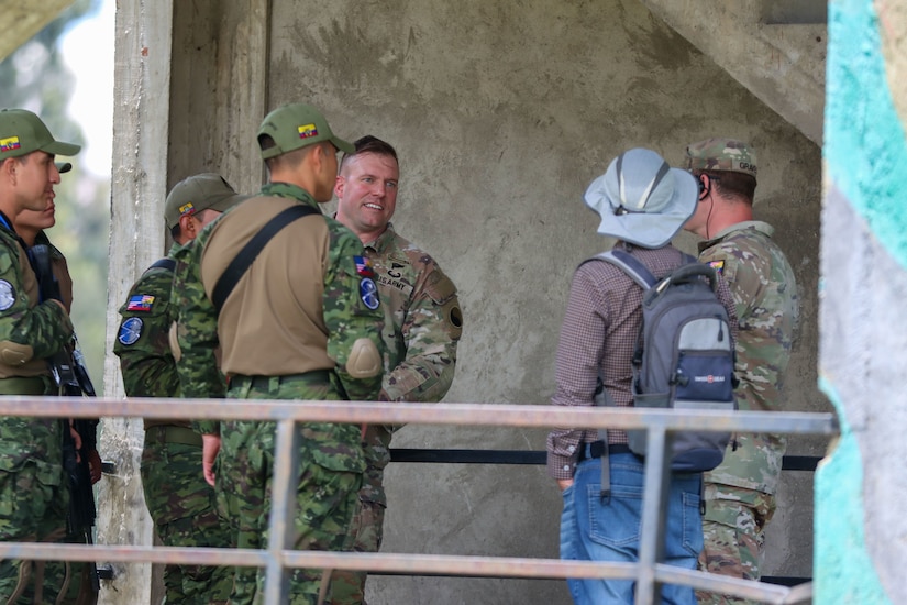 Sgt. 1st Class Gregory Thiemann speaks to a special forces team from the Ecuadorian Army during a subject matter expert exchange in urban operations tactics, March 21, 2024.