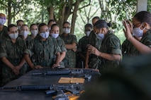 Corpo de Fuzileiros Navais (Brazilian Marine Corps) recruits attend a weapon maintenance class during a Recruit Training Subject Matter Expert Exchange between U.S. and Brazilian Marine drill instructors at Centro de Instrução Almirante Milcíades Portela Alves, Brazil, on April 4, 2024. The SMEE aims to enhance the training frameworks and leadership skills necessary for the successful integration of female recruits into the Brazilian Marine Corps. Additionally, the exchange fosters a bilateral partnership, enabling both nations to share best practices and innovations in military training and operational readiness. (U.S. Marine Corps photo by Lance Cpl. David Intriago)