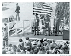 OSI Special Agents watching the crowd gathered around the returned crew of the Space Shuttle Challenger.