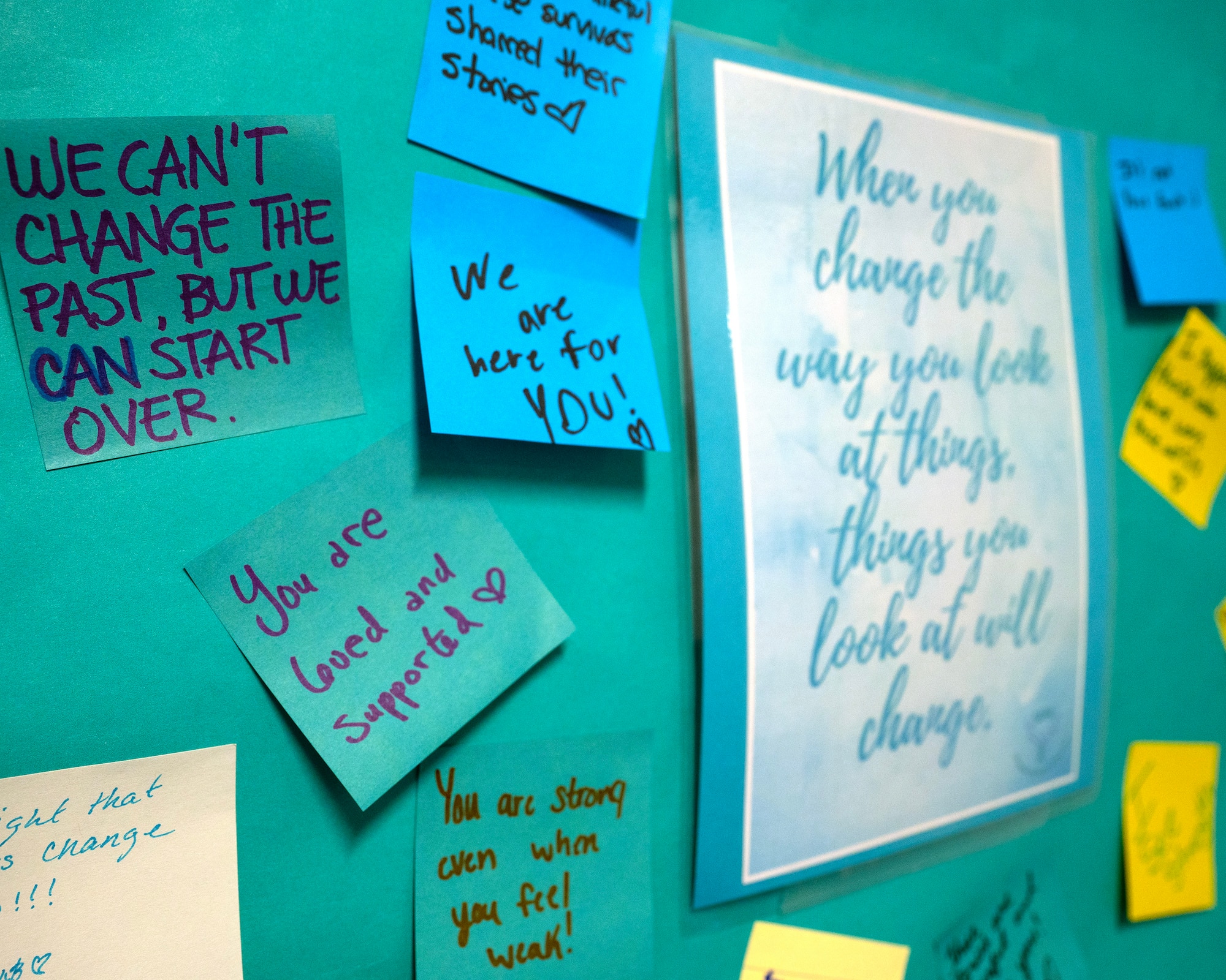 Attendees post encouraging notes for display during a “What were you wearing,” event, April 10, 2024, at Fort George G. Meade, Maryland. The event aims to combat victim blaming related to clothing worn during sexual assault and harassment incidents. (U.S. Air Force photo by Tech. Sgt. Kevin Iinuma)