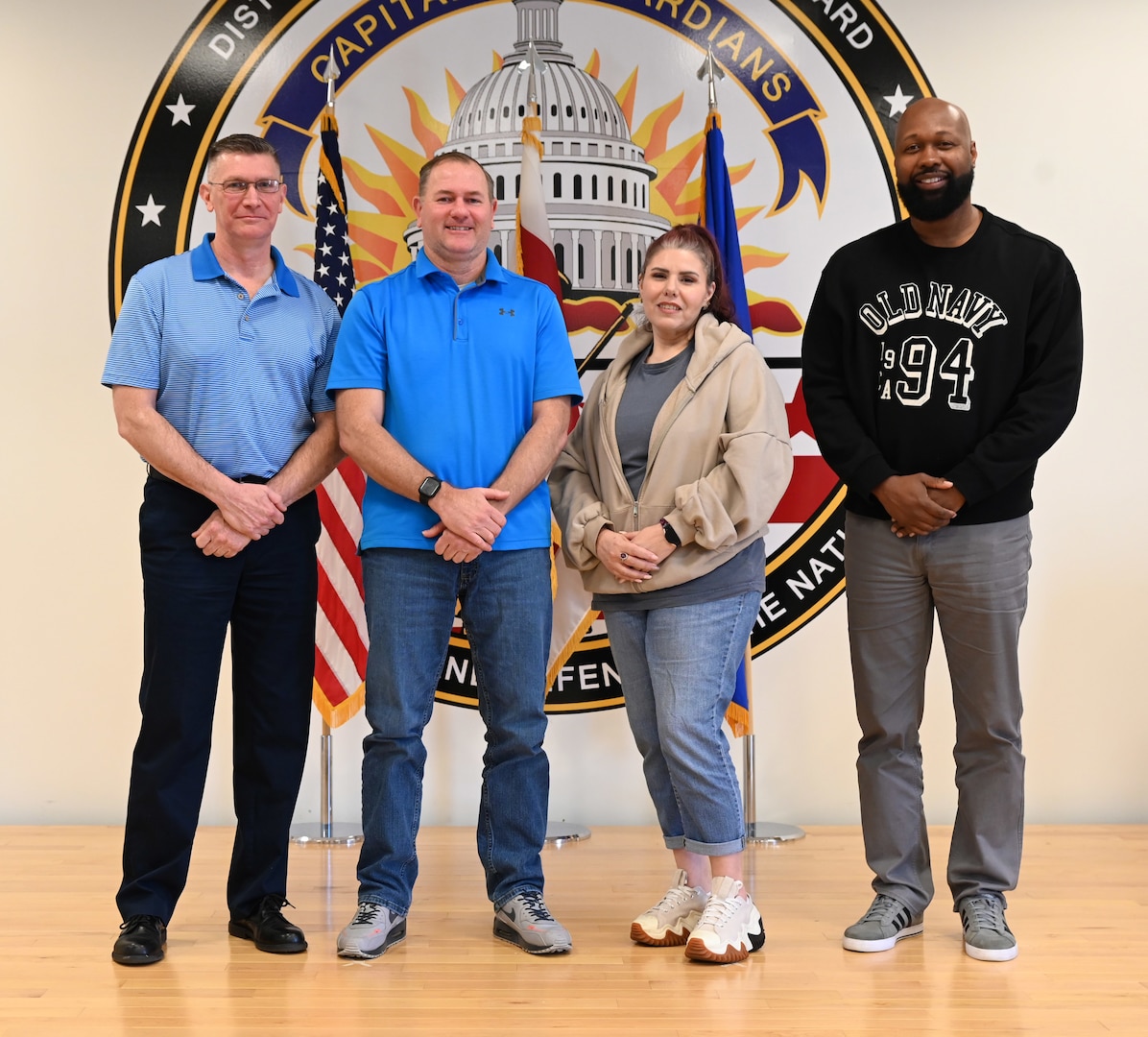 From left, Mr. Joseph Althoff, Integrated Primary Prevention Manager; Mr. Jason Dickson, DCANG Prevention Coordinator, Ms. Juliann Bryant, DCANG Prevention Analyst, and Mr. Karlus Madison, DCARNG Prevention Analyst, stand for a photograph following a meeting at Joint Base Andrews, April 5, 2024. The District of Columbia National Guard's Integrated Resilience Operations (IRO) program equips the organization with the knowledge, skills, tools and resources required to continually assess and adjust mitigation plans for unit commanders and senior leaders of the D.C. National Guard geared toward identifying where the organization succeeds and where there's challenges.