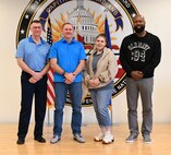 From left, Mr. Joseph Althoff, Integrated Primary Prevention Manager; Mr. Jason Dickson, DCANG Prevention Coordinator, Ms. Juliann Bryant, DCANG Prevention Analyst, and Mr. Karlus Madison, DCARNG Prevention Analyst, stand for a photograph following a meeting at Joint Base Andrews, April 5, 2024. The District of Columbia National Guard's Integrated Resilience Operations (IRO) program equips the organization with the knowledge, skills, tools and resources required to continually assess and adjust mitigation plans for unit commanders and senior leaders of the D.C. National Guard geared toward identifying where the organization succeeds and where there's challenges.