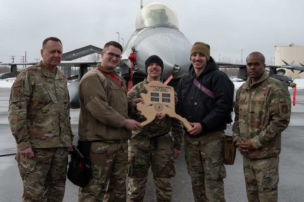 Airmen assigned to the 18th Fighter Generation Squadron pose for a photo after winning the quarterly load competition at Eielson Air Force Base, Alaska, April 5, 2024.