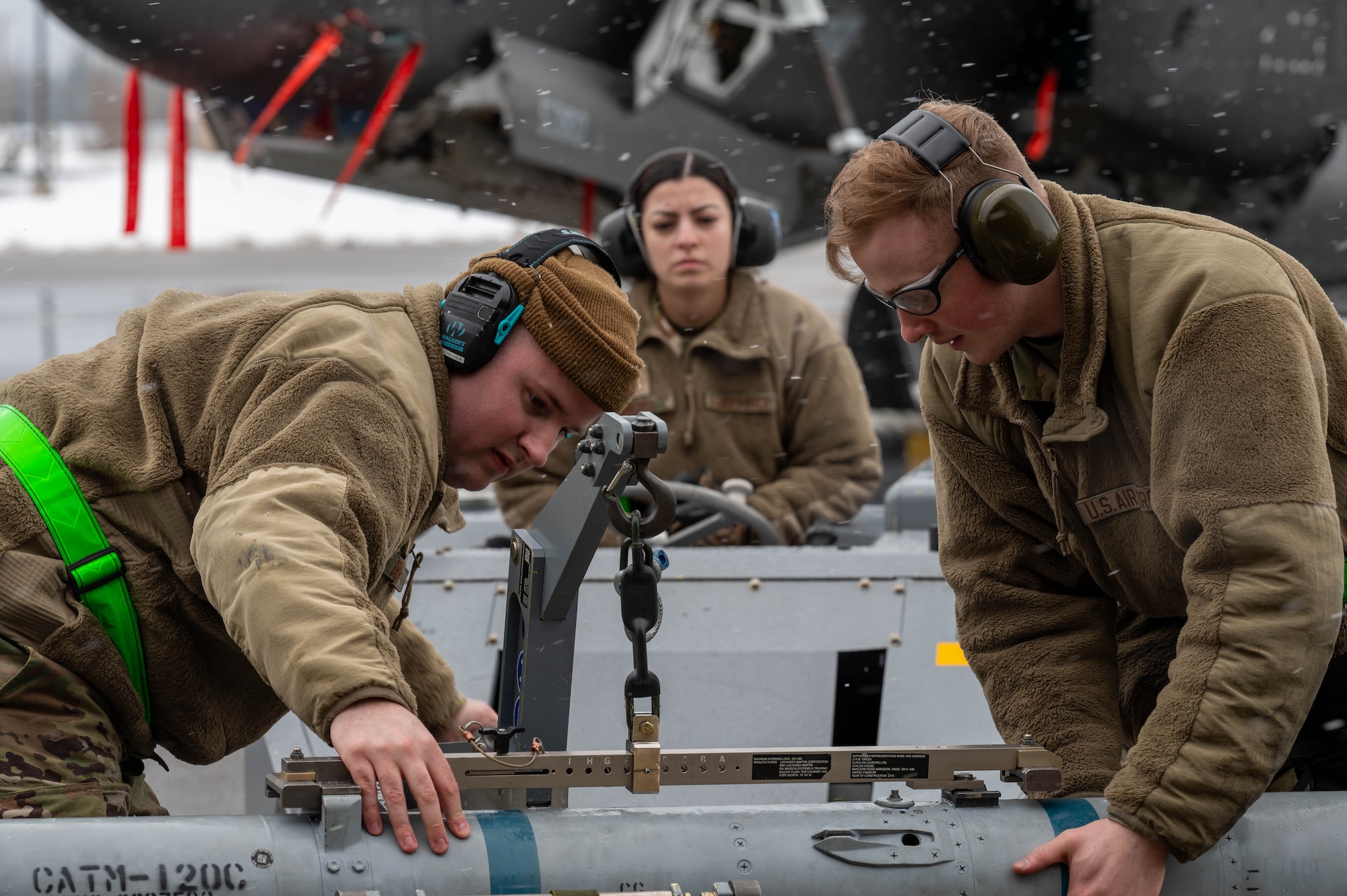 Airmen assigned to the 356th Fighter Generation Squadron prepare munitions for loading during a load competition at Eielson Air Force Base, Alaska, April 5, 2024.