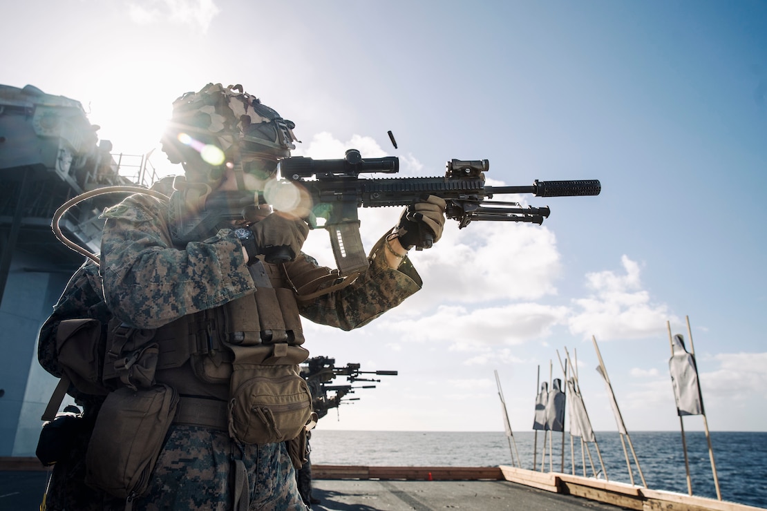 U.S. Marine Corps Lance Cpl. Jack Geels, a team leader assigned to Bravo Company, Battalion Landing Team 1/5, 15th Marine Expeditionary Unit, and native of Iowa, fires an M27 Infantry Automatic Rifle during a live-fire deck shoot aboard the amphibious assault ship USS Boxer (LHD 4) in the Pacific Ocean April 6, 2024. Elements of the 15th MEU are currently embarked aboard the Boxer Amphibious Ready Group conducting routine operations in U.S. 3rd Fleet.