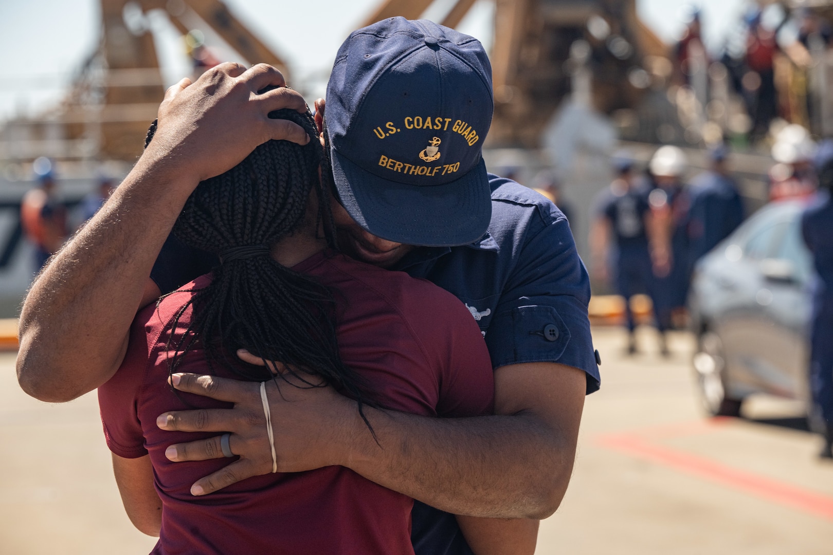 U.S. Coast Guard Chief Petty Officer Jerome Manuel, an Storekeeper assigned to the Coast Guard Cutter Bertholf (WMSL 750) greets his family at the cutter's return to home port on Coast Guard Base Alameda, Calif., following a 98-day patrol in the Indo-Pacific region, April 8, 2024. The crew returned following a 21,000-mile, 98-day Indo-Pacific deployment in support of U.S. Indo-Pacific Command and U.S. Navy's Seventh Fleet. (U.S. Coast Guard Photo by Petty Officer 3rd Class Hunter Schnabel)
