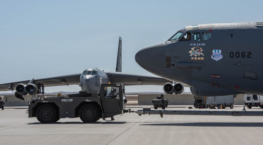 A U.S. Air Force B-52H Stratofortress assigned to the 96th Bomb Squadron at Barksdale Air Force Base, Louisiana, is towed on the flightline during Prairie Vigilance 24-3 at Minot Air Force Base, North Dakota, April 6, 2024. Prairie Vigilance serves to assure Allies and partners that the U.S. is ready to execute nuclear operations and global strike anytime, anywhere, in order to deter and, if necessary, respond to strategic attack. (U.S. Air Force photo by Airman 1st Class Kyle Wilson)