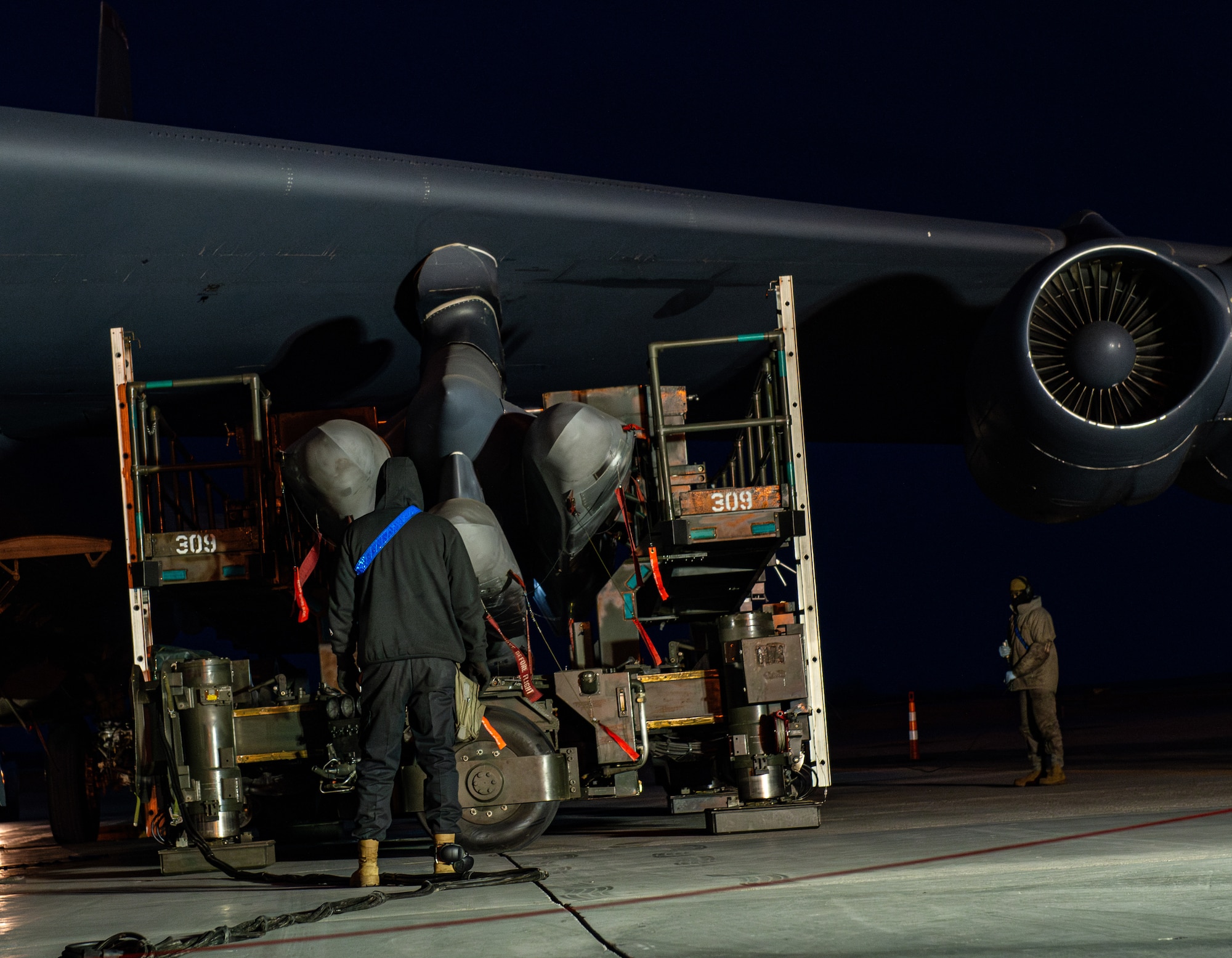 Airmen assigned to the 5th Aircraft Maintenance Squadron load weapons onto a B-52H Stratofortress during Exercise Prairie Vigilance/Bayou Vigilance 24-3 at Minot Air Force Base, North Dakota, April 7, 2024. Exercises like this help Air Force Global Strike Command maintain a credible strategic capability that enhances deterrence of threats to the United States and its allies and partners. (U.S. Air Force photo by Airman 1st Class Alyssa Bankston)