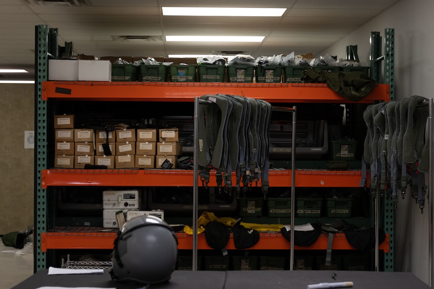 Aircrew flight equipment is displayed inside the 5th Operations Support Squadron AFE office during Prairie Vigilance 24-3 at Minot Air Force Base, North Dakota, April 8, 2024. Prairie Vigilance focuses on the safe and secure handling of assets and capabilities comprising the nuclear triad. (U.S. Air Force photo by Airman 1st Class Trust Tate)