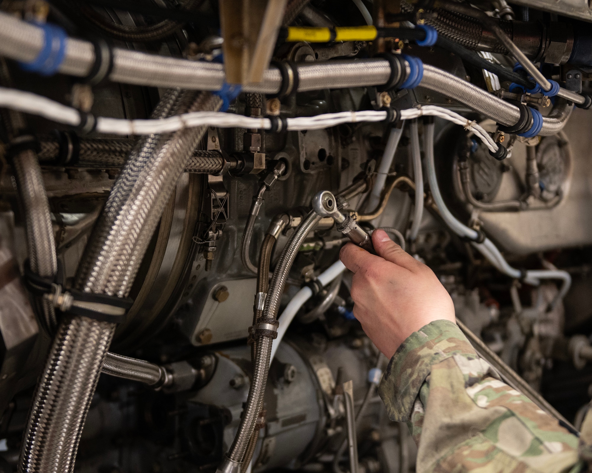 U.S. Air Force Staff Sgt Kolin Kelly, an Aerospace Propulsion Specialist at the 133rd Maintenance Group, works on a prop rod from a C-130 Hercules engine in St. Paul, Minn., April 4, 2024.
