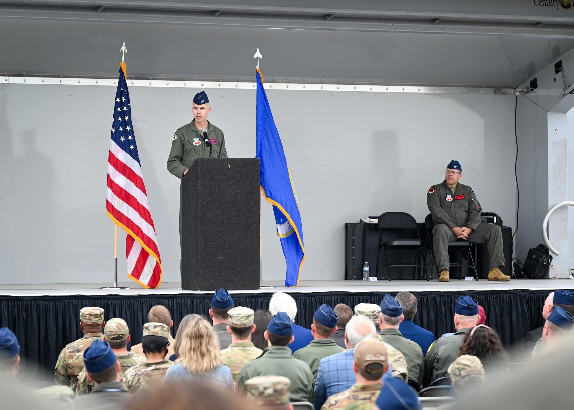 Colonel Merrell delivers a speech to an audience.