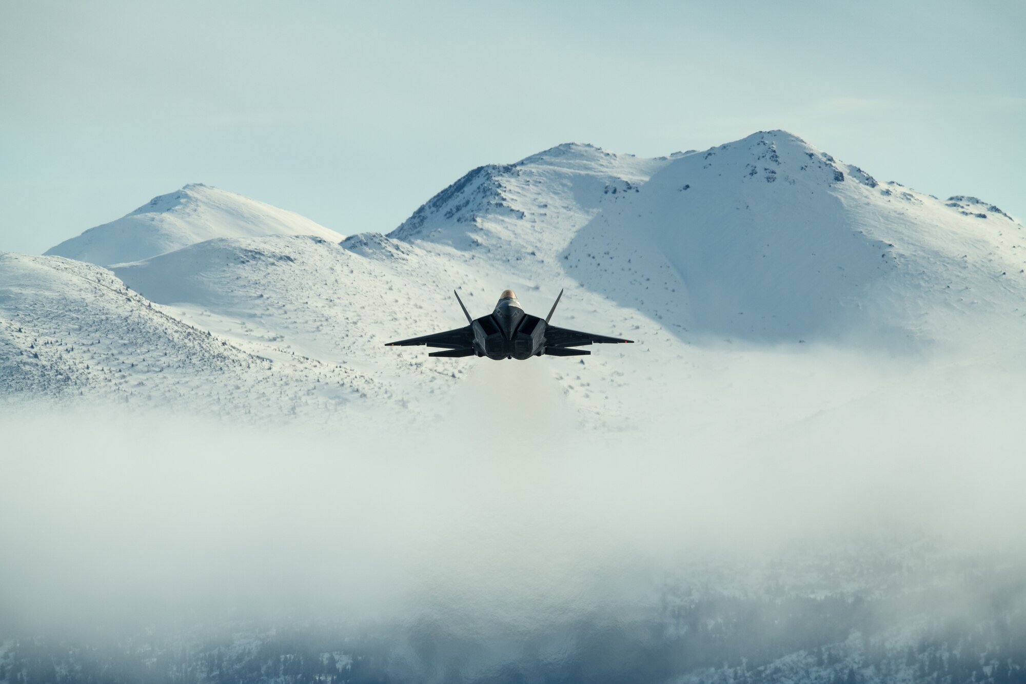 A photo of an F-22 Raptor taking off