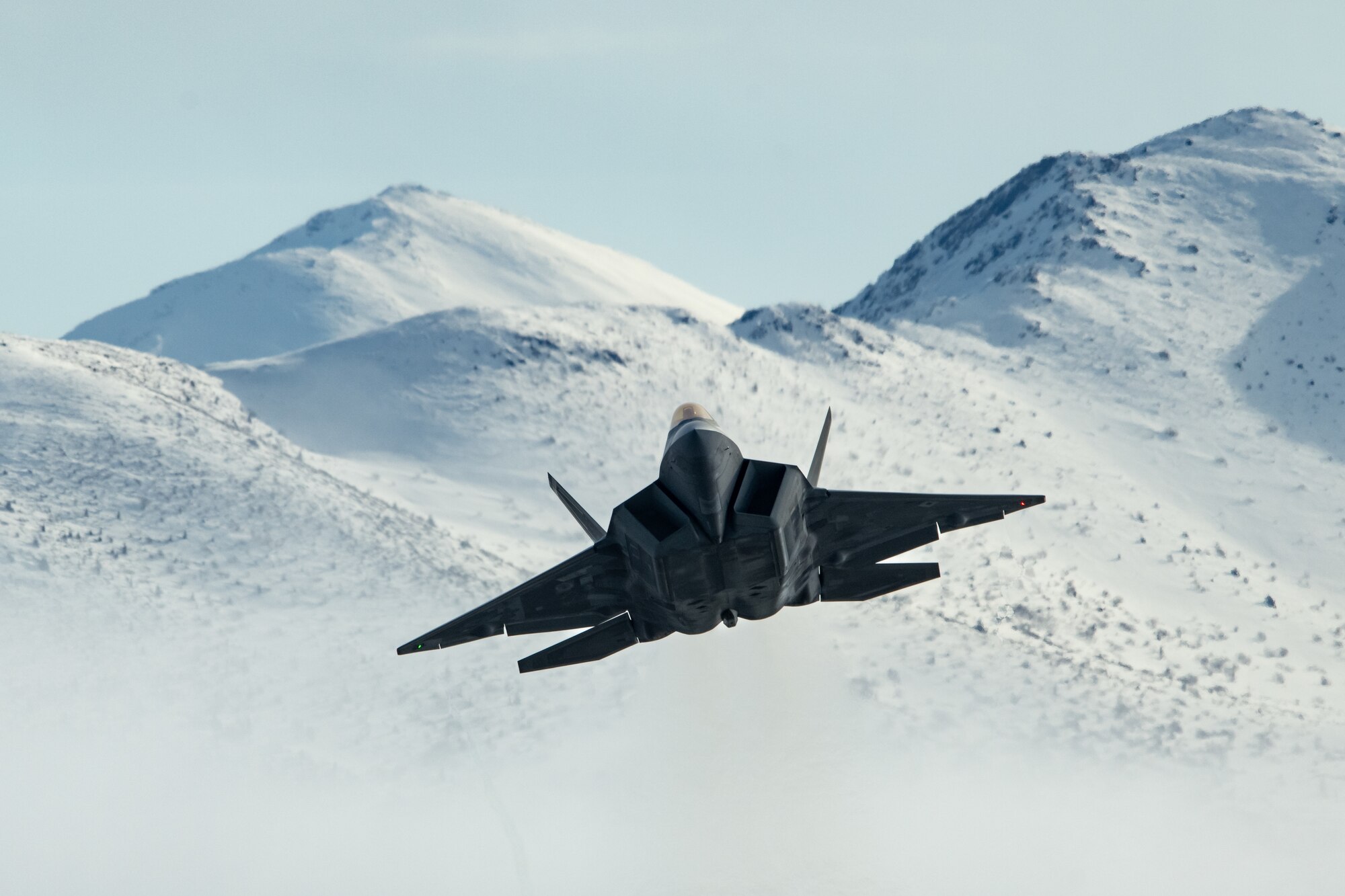 A photo of an F-22 Raptor taking off