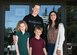 Renee Olivas, Military and Family Readiness Center community readiness consultant and Rachel Emmerthal, Commander’s Key Support Program Key Support liaison and her family pose for a photo at Vandenberg Space Force Base, Calif., April 2, 2024. The U.S. Air and Space Force Commander's Key Support Program is an official Unit Family Readiness Program aimed at bolstering readiness and fostering a sense of community. (U.S. Space Force photo by Senior Airman Tiarra Sibley)