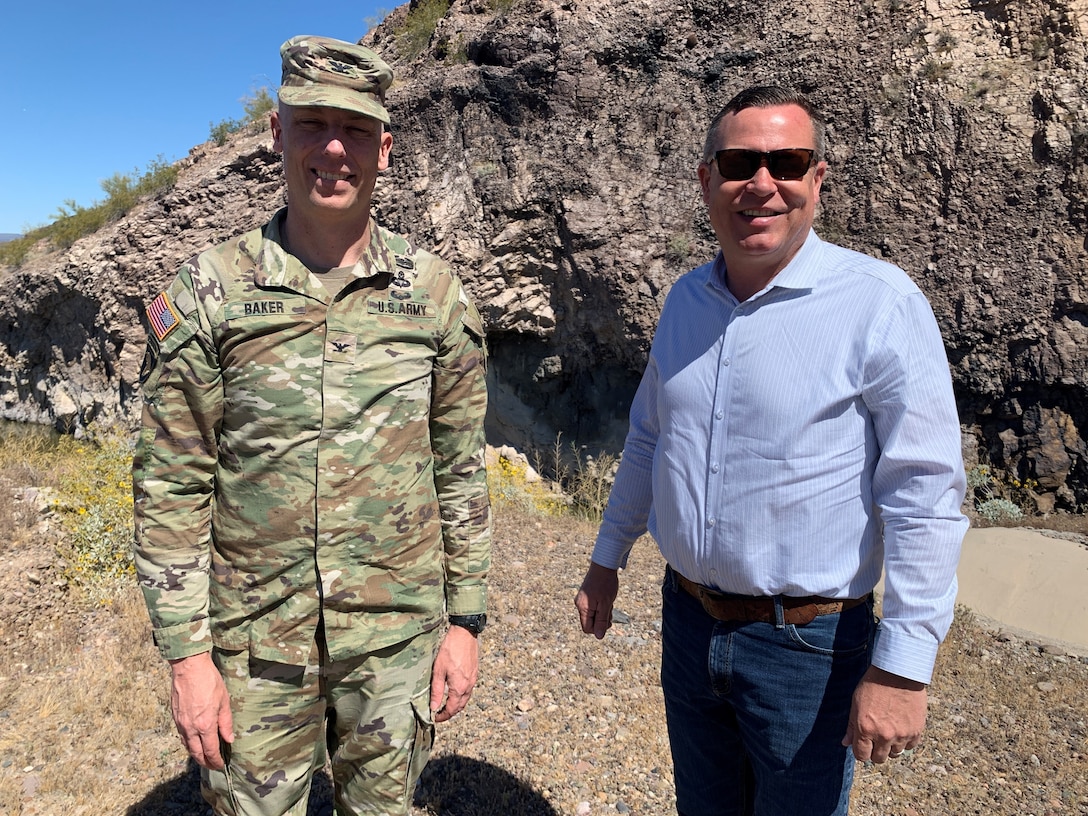 Col. Andrew Baker, commander of the U.S. Army Corps of Engineers Los Angeles District, right, and Justin Gay, deputy district engineer for the LA District, visit Painted Rock Dam March 25 near Gila Bend, Arizona.