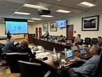 Group discusses product support during meeting