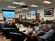 Group discusses product support during meeting