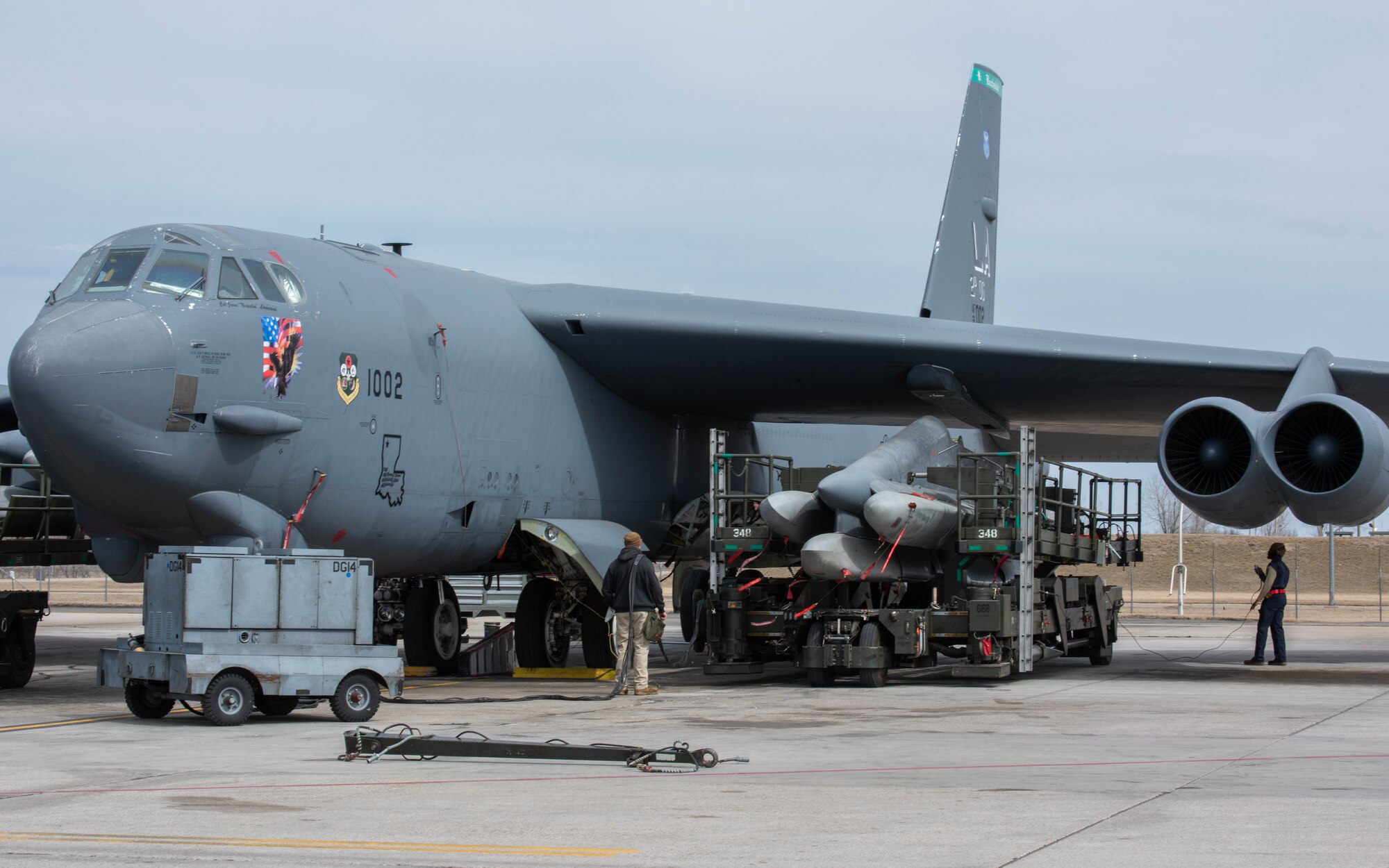 Airmen assigned to the 5th Maintenance Group load AGM-86 air-launched cruise missiles onto a B-52H Stratofortress during Prairie Vigilance 24-3 at Minot Air Force Base, North Dakota, April 7, 2024. Prairie Vigilance serves to assure allies and partners that the U.S. is ready to execute nuclear operations and global strike anytime, anywhere, in order to deter and, if necessary, respond to strategic attack. (U.S. Air Force photo by Airman 1st Class Kyle Wilson)