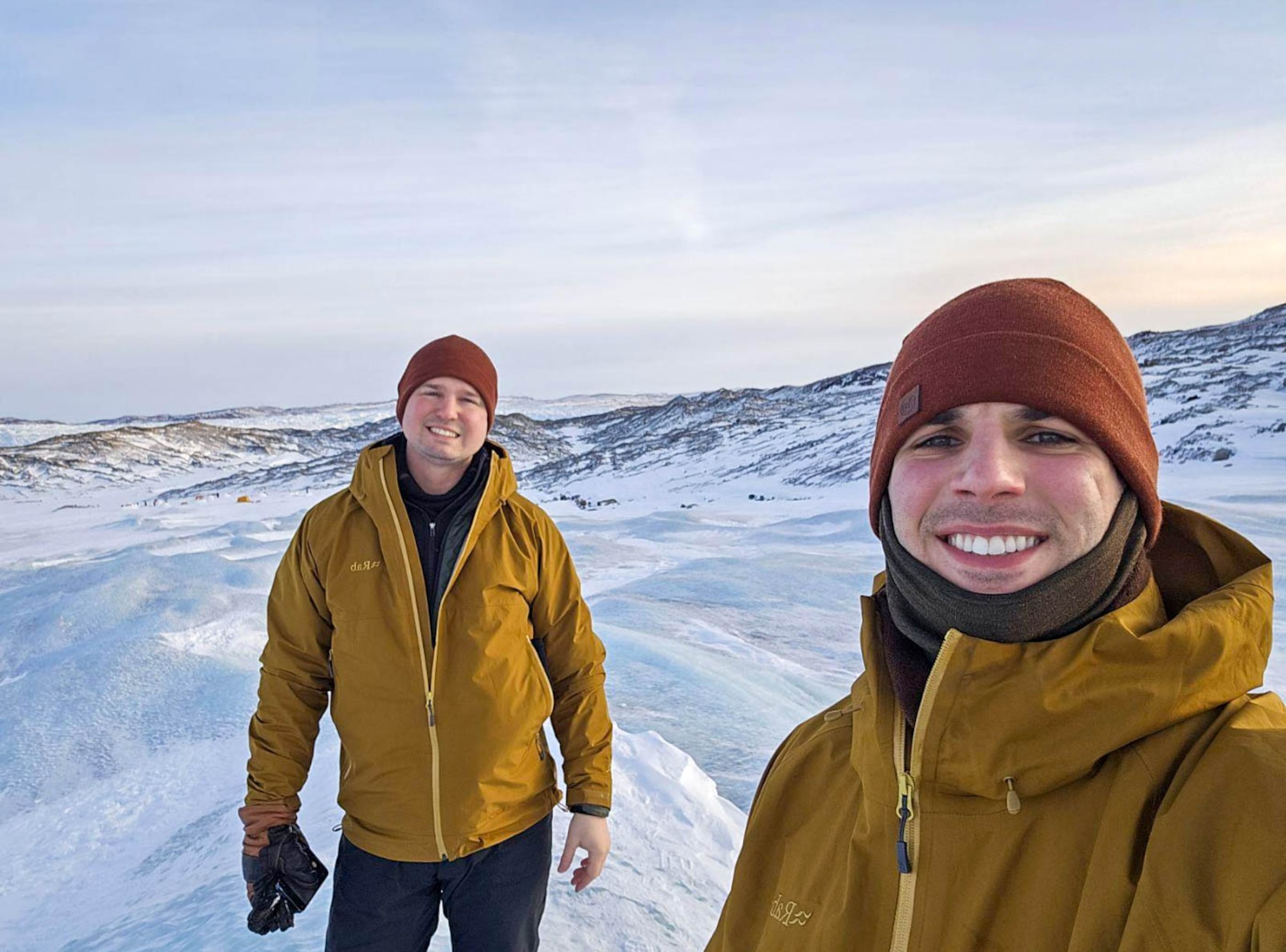 Two instructors stand on Point 660 in Kangerlussuaq, Greenland.