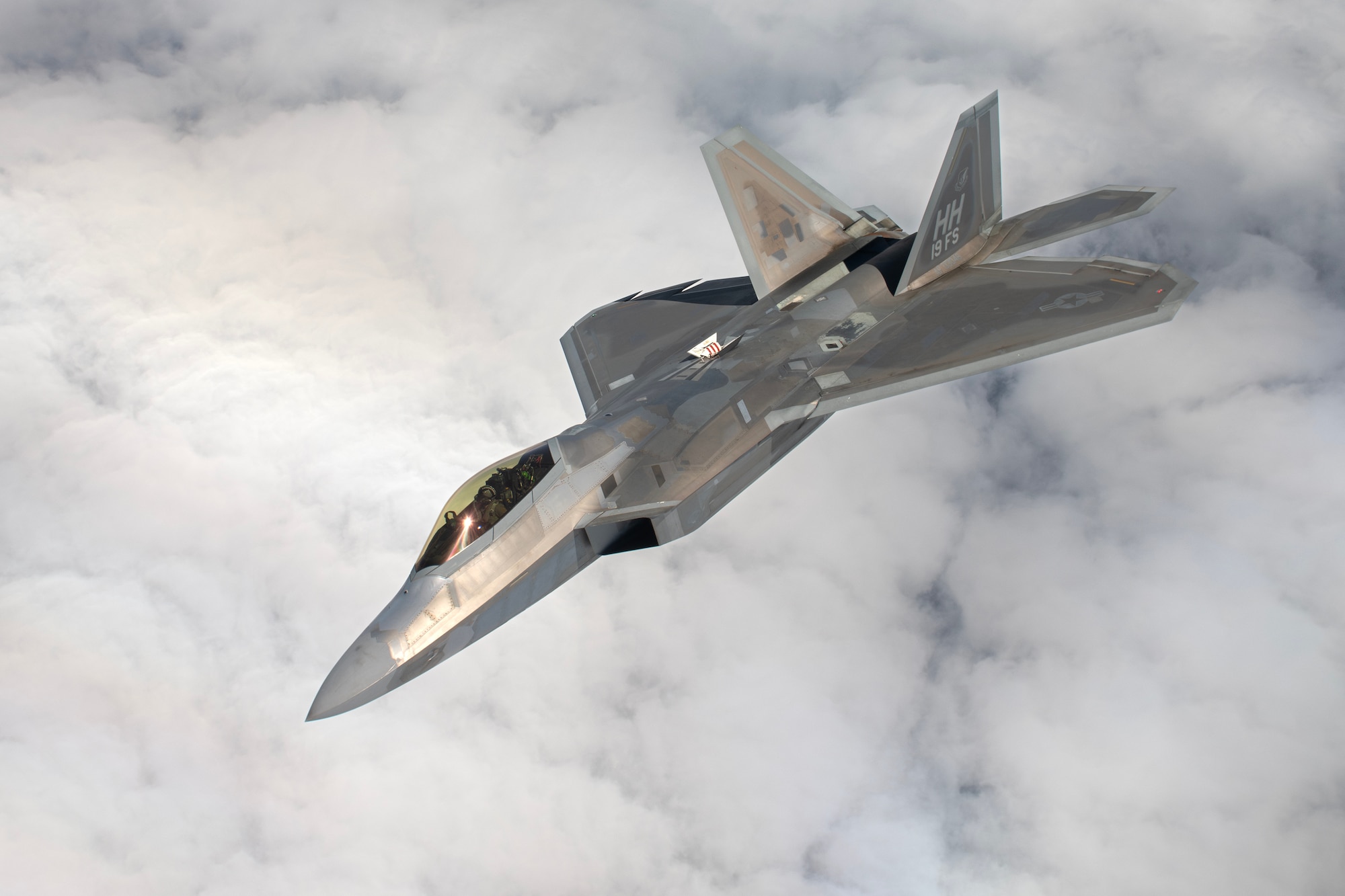 An F-22A Raptor assigned to the 19th Fighter Squadron, Joint Base Pearl Harbor–Hickam, Hawaii, departs after receiving aerial refueling during a large force exercise over the Pacific Ocean, April 10, 2024. The rotational presence of advanced fighter aircraft in the keystone of the pacific enables the 18th Wing to practice large-scale exercises to ensure a free and open Indo-Pacific. (U.S. Air Force photo by Staff Sgt. Jessi Roth)