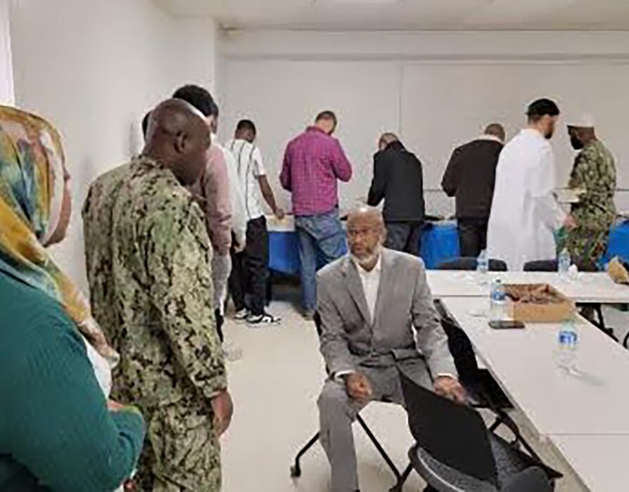 Chaplain Lt. j.g. Mohammed Lawal (center), one of six Navy Muslim chaplins, spoke to members of the congregation that attended the Ramadan Iftar at the chapel on NAS Norfolk, Apr. 5, 2024.