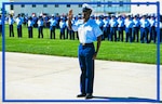 U.S. Coast Guard Seaman Arsene Katumbayi graduates from U.S. Coast Guard Training Center Cape May during a ceremony, Sept. 15, 2023 –as a new fleet member and a naturalized citizen. In conjunction with U.S. Citizenship and Immigration Services, the U.S. Coast Guard allows eligible residents to become naturalized citizens after successful completion of boot camp by conducting applicable interviews and screenings during training, meeting with the Staff Judge Advocate, and passing their citizenship test. Cape May is one of four training centers now authorized to certify honorable service for members’ citizenship applications. (U.S. Coast Guard photo by Petty Officer 2nd Class Gregory Schell)