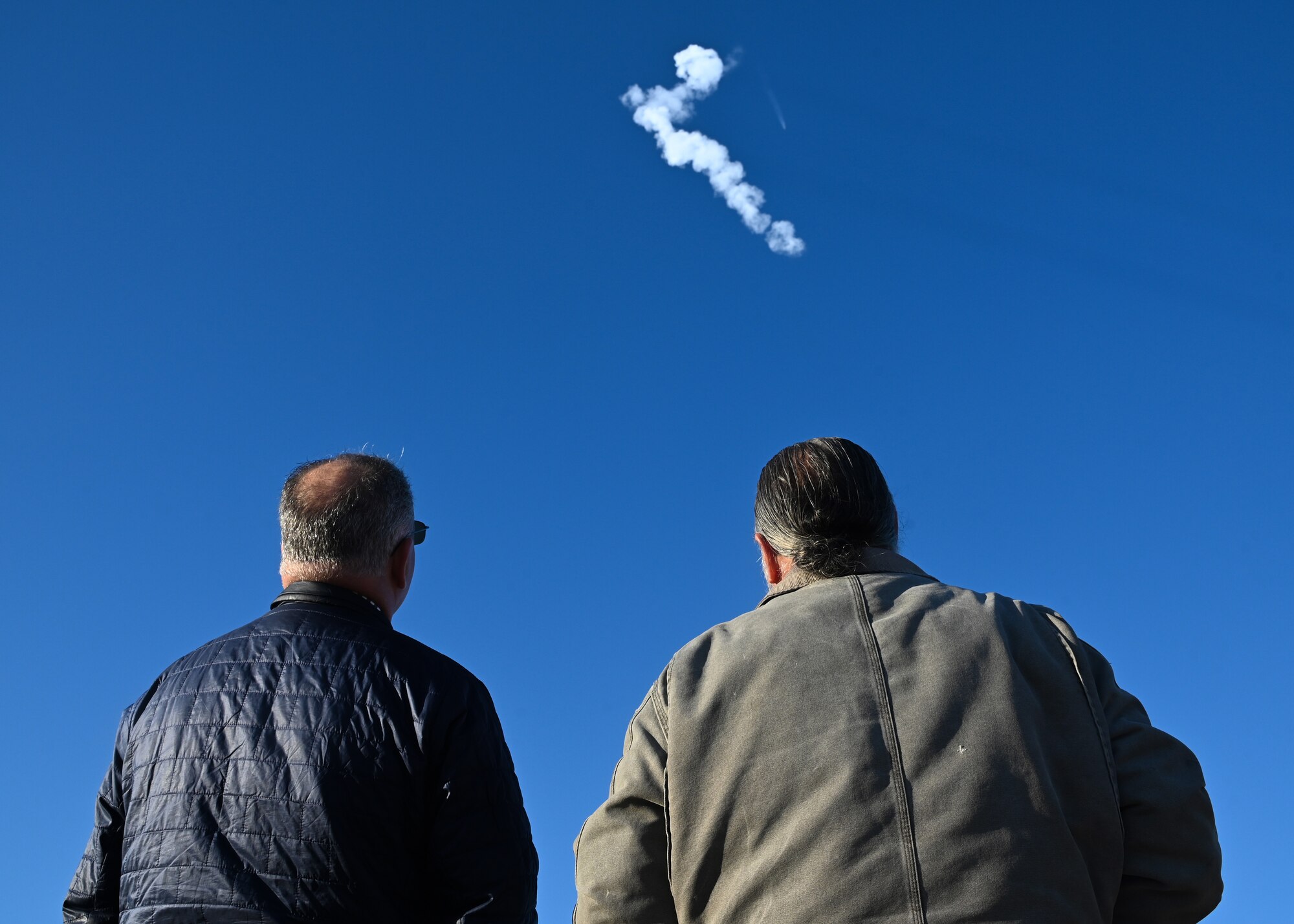 people watch as ussf-62 launches from vsfb