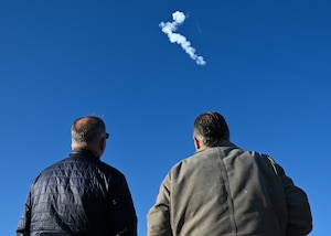 people watch as ussf-62 launches from vsfb