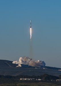 A rocket launches from a base.