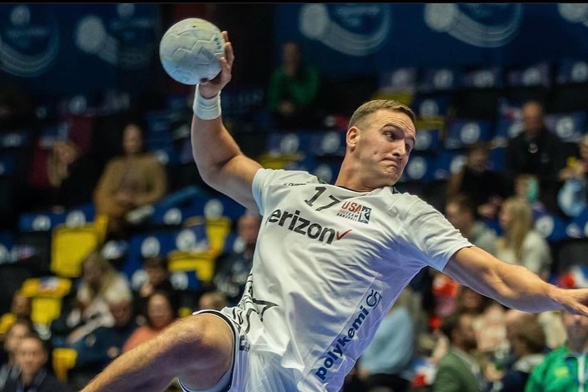 An athlete gets ready to throw a ball.