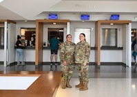 From left to right, Tech. Sgt. Alicia Acuna-Berry, 59th Medical Diagnostic and Therapeutic Squadron Central Fill Pharmacy noncommissioned officer in charge, and her sister, Staff Sgt. Angelina McCoy, 59th Medical Wing staff agency education and training manager, pose for a photo in honor of National Sibling Day at Wilford Hall Ambulatory Surgical Center, Joint Base San Antonio-Lackland, Texas, April 10, 2024. Inspired by her mother's work as a pharmacy technician, Acuna-Berry shared that with the support of her mother, she enrolled in the Delayed Entry Program at the age of 16 and enlisted at 18 years old driven by her own desire to help people and serve her country. (U.S. Air Force photo by Senior Airman Melody Bordeaux)