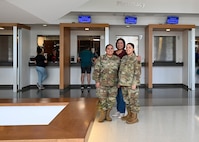 From left to right, Tech. Sgt. Alicia Acuna-Berry, 59th Medical Diagnostic and Therapeutic Squadron Central Fill Pharmacy noncommissioned officer in charge, her mother, Ursula Martinez, 59th MDTS Wilford Hall pharmacy technician, and her daughter, Staff Sgt. Angelina McCoy, 59th Medical Wing staff agency education and training manager, pose for a photo in honor of National Sibling Day at Wilford Hall Ambulatory Surgical Center, Joint Base San Antonio-Lackland, Texas, April 10, 2024. Ursula shared that her career began in 1999 as a pharmacy technician and she cherishes the opportunity to help patients while remaining close to her daughters. (U.S. Air Force photo by Senior Airman Melody Bordeaux)