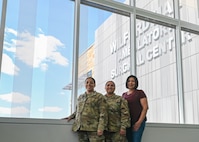 From left to right, Staff Sgt. Angelina McCoy, 59th Medical Wing staff agency education and training manager, her sister, Tech. Sgt. Alicia Acuna-Berry, 59th Medical Diagnostic and Therapeutic Squadron Central Fill Pharmacy noncommissioned officer in charge, and their mother, Ursula Martinez, 59th MDTS Wilford Hall pharmacy technician, pose for a photo in honor of National Sibling Day at Wilford Hall Ambulatory Surgical Center, Joint Base San Antonio-Lackland, Texas, April 10, 2024. McCoy shared that while she began her career as a Structural Journeyman, she realized her passion for assisting and educating others to achieve success in their careers, which led her to retrain as an Education and Training Manager in 2018. (U.S. Air Force photo by Senior Airman Melody Bordeaux)