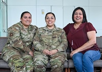 From left to right, Tech. Sgt. Alicia Acuna-Berry, 59th Medical Diagnostic and Therapeutic Squadron Central Fill Pharmacy noncommissioned officer in charge, her sister, Staff Sgt. Angelina McCoy, 59th Medical Wing staff agency education and training manager, and their mother, Ursula Martinez, 59th MDTS Wilford Hall pharmacy technician, pose for a photo in honor of National Sibling Day at Wilford Hall Ambulatory Surgical Center, Joint Base San Antonio-Lackland, Texas, April 10, 2024. Acuna-Berry, McCoy, and Martinez expressed the happiness they feel working together at the 59th Medical Wing. They noted that their children spending ample time together fosters a sense of siblinghood among them and cherish the support and playful banter between sisters and their mother. (U.S. Air Force photo by Senior Airman Melody Bordeaux)