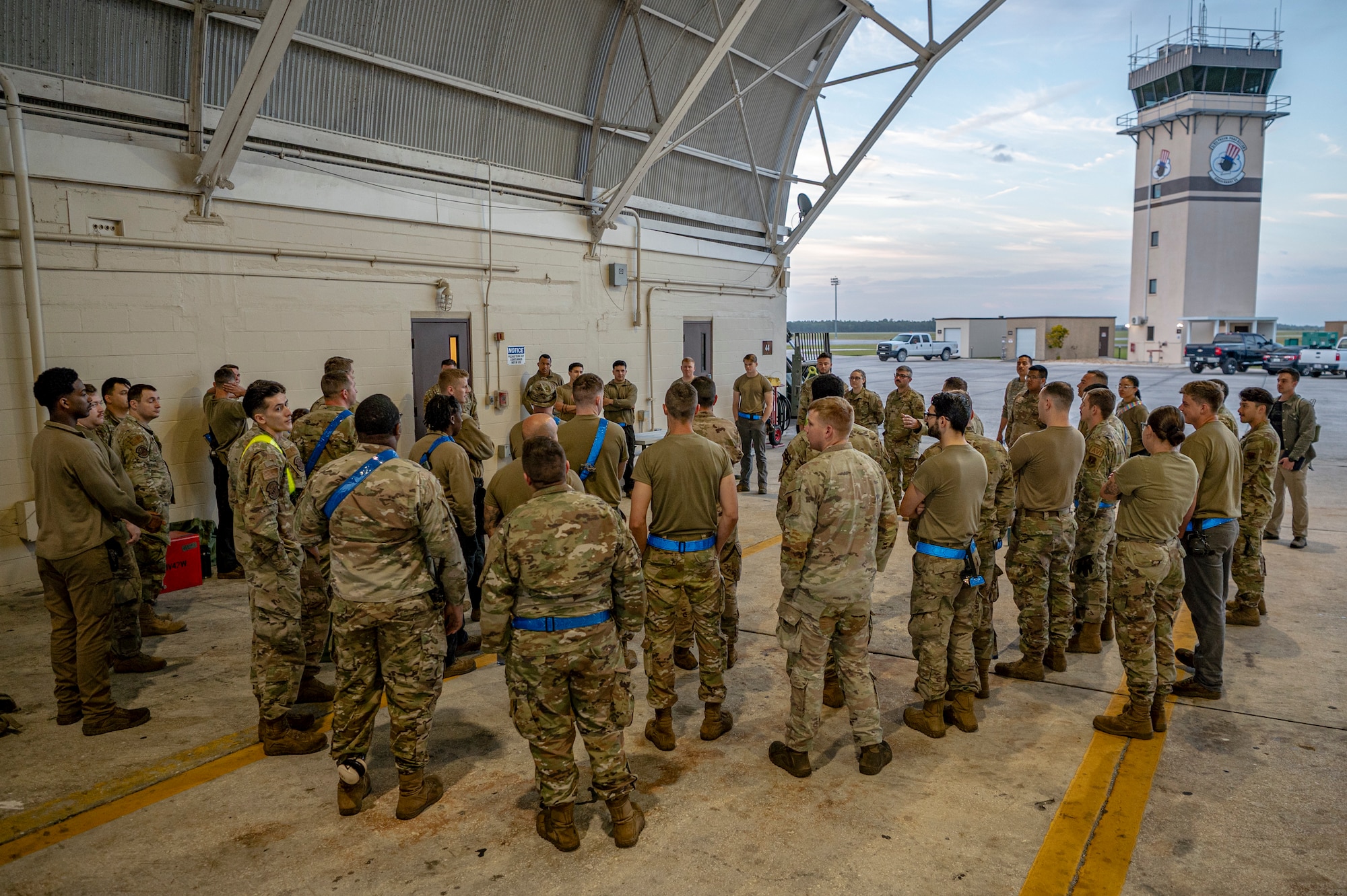 U.S. Air Force Airmen assigned to the 74th Fighter Generation Squadron receive a morning brief for Exercise Ready Tiger 24-1 at Avon Park Air Force Range, Florida, April 10, 2024. Small teams were quickly transported to an austere location to provide support and generate sorties while practicing Agile Combat Employment concepts. Built upon Air Combat Command's directive to assert air power in contested environments, Exercise Ready Tiger 24-1 aims to test and enhance the 23rd Wing’s proficiency in executing Lead Wing and Expeditionary Air Base concepts through Agile Combat Employment and command and control operations. (U.S. Air Force photo by Airman 1st Class Leonid Soubbotine)