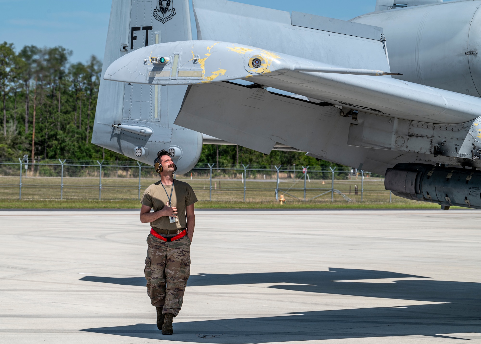 A U.S. Air Force Airman assigned to the 74th Fighter Generation Squadron inspects an A-10C Thunderbolt II during Exercise Ready Tiger 24-1 at Avon Park Air Force Range, Florida, April 10, 2024. Tactical aircraft maintenance specialists ensure that every component of the aircraft is working in tandem to deliver air support and air power anywhere, anytime. Built upon Air Combat Command's directive to assert air power in contested environments, Exercise Ready Tiger 24-1 aims to test and enhance the 23rd Wing’s proficiency in executing Lead Wing and Expeditionary Air Base concepts through Agile Combat Employment and command and control operations. (U.S. Air Force photo by Airman 1st Class Leonid Soubbotine)