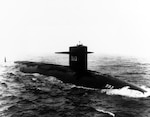(SSN-593) Starboard bow view, taken at sea on 24 July 1961. Official U.S. Navy Photograph, from the collections of the Naval History and Heritage Command.
