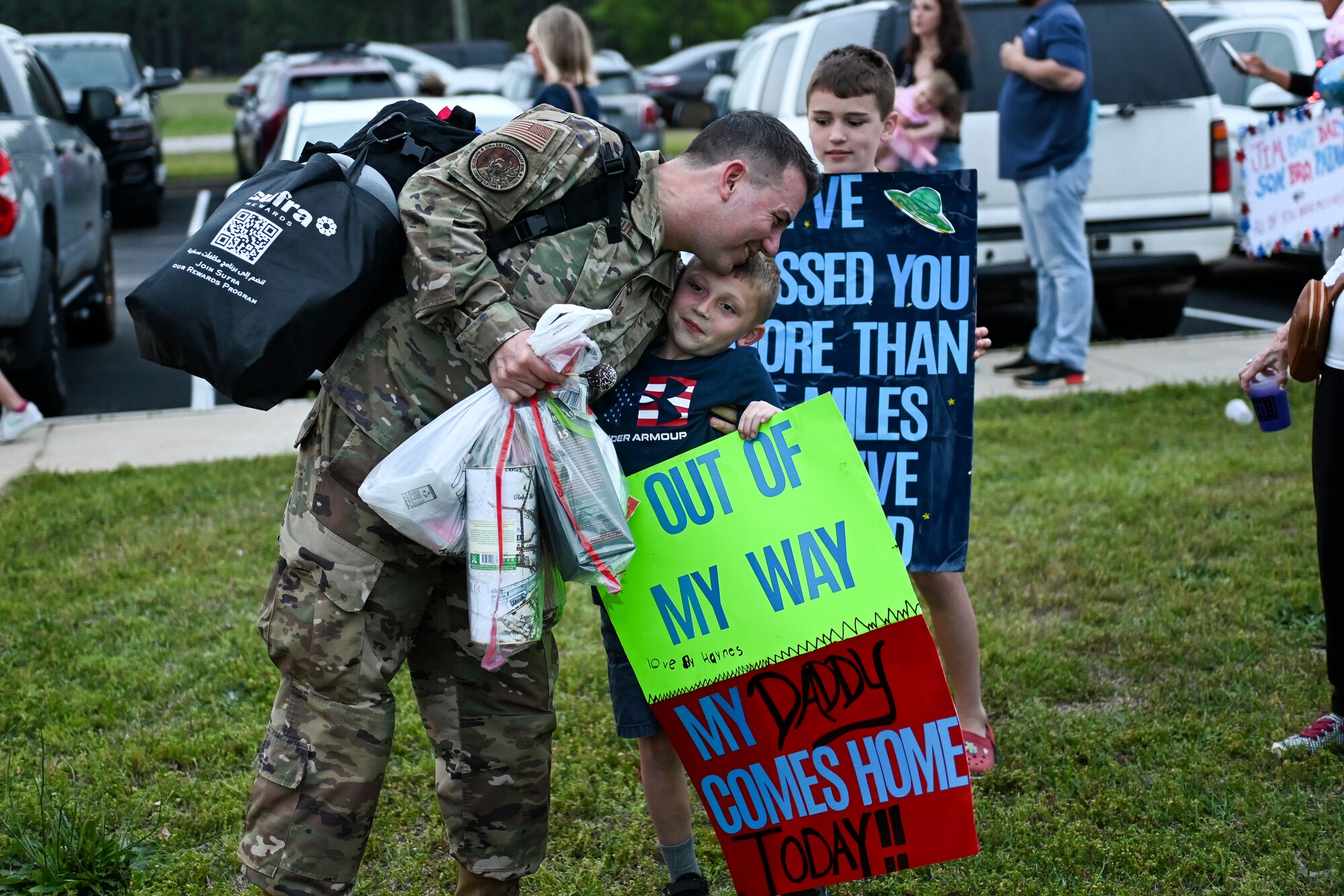 U.S. Airmen assigned to the 169th Fighter Wing, South Carolina Air National Guard, are greeted by family and wing personnel as they return from a six-month deployment to the U.S. Central Command area of responsibility, April 10, 2024. Approximately 150 Swamp Fox Airmen deployed in support of 9th Air Force (Air Forces Central) to the U.S. Central Command area of responsibility, the unit’s first deployment as an expeditionary air base team under the new Air Force Force Generation model. (U.S. Air National Guard photo by Senior Master Sgt. Caycee Watson)