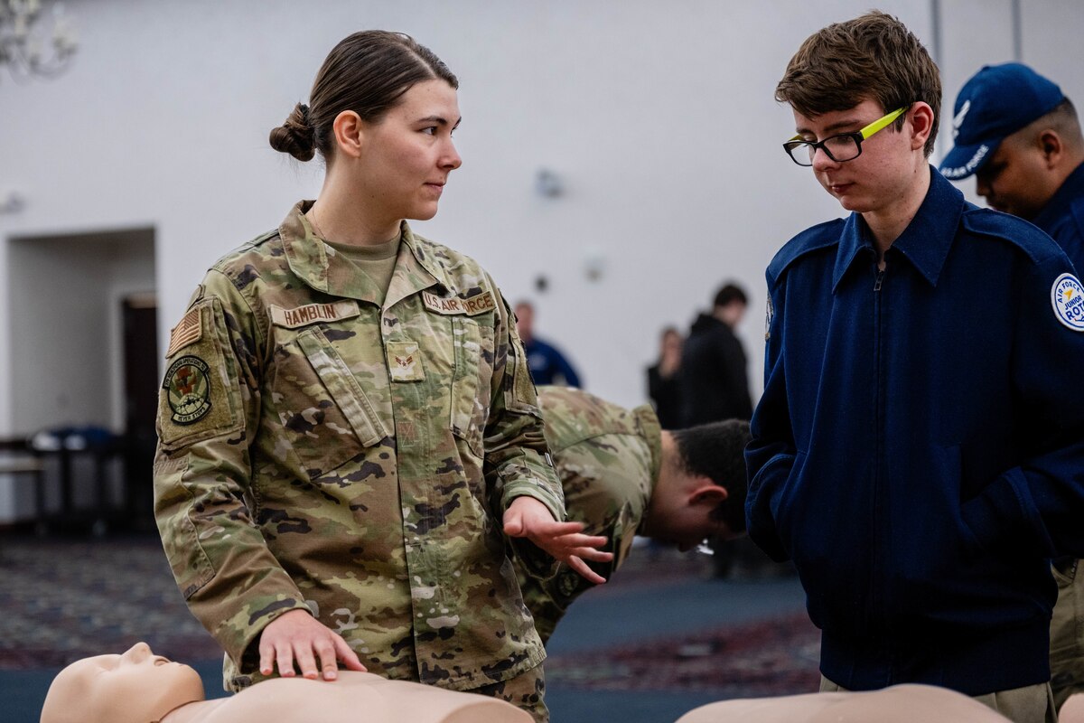 Airman Speaks to cadet.