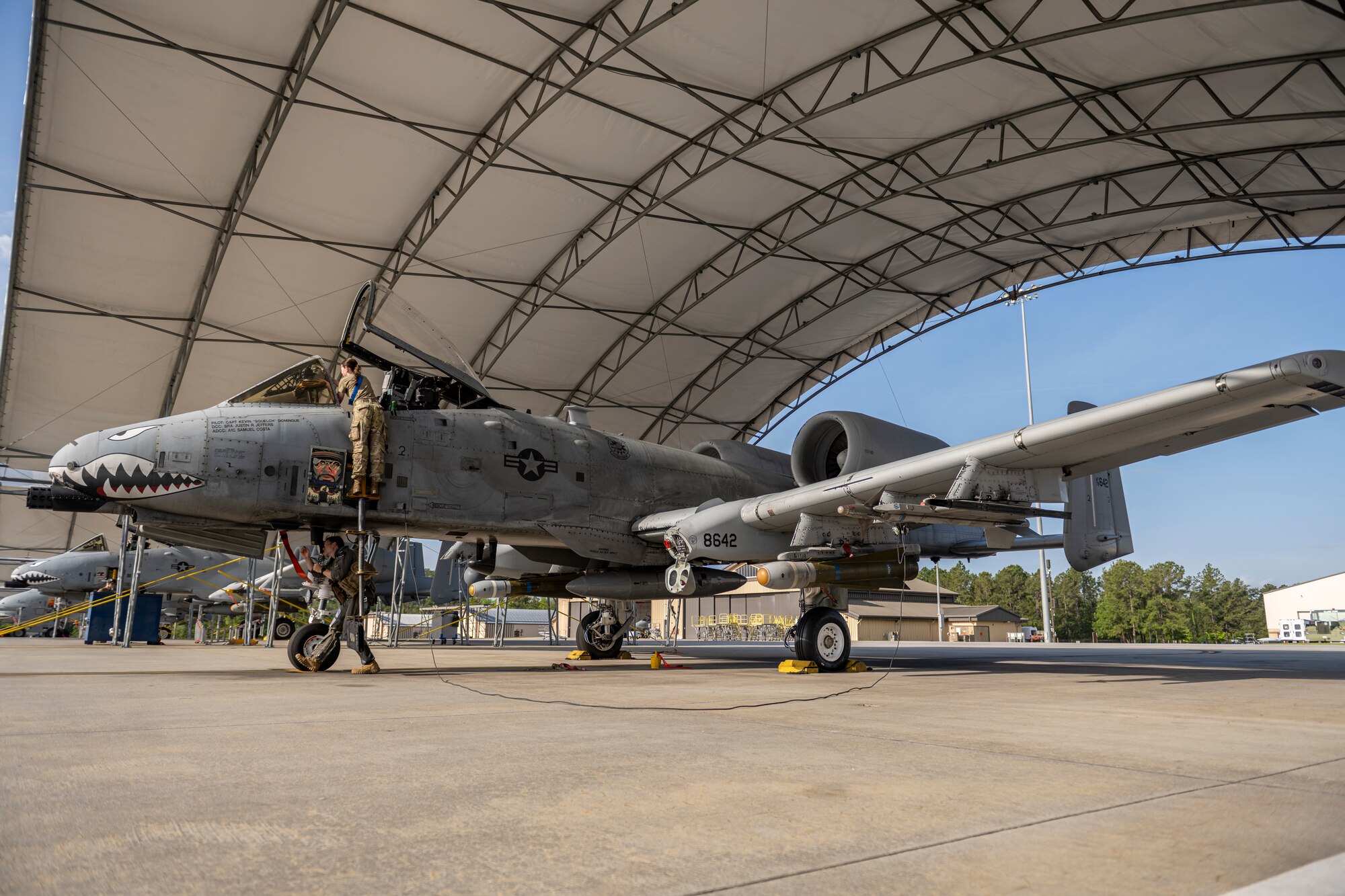 U.S. Air Force Capt. Riley Nix, 74th Fighter Squadron A-10C Thunderbolt II pilot, and Airman Gabrielle Shipley, 74th Fighter Generation Squadron crew chief, perform a pre-flight inspection on an A-10 during Exercise Ready Tiger 24-1 at Moody Air Force Base, Georgia, April 10, 2024. Pilots and crew chiefs perform inspections before takeoff to ensure the aircraft can operate safely. Ready Tiger 24-1 is a readiness exercise demonstrating the 23rd Wing’s ability to plan, prepare and execute operations and maintenance to project air power in contested and dispersed locations, defending the United States’ interests and allies. (U.S. Air Force photo by Senior Airman Deanna Muir)