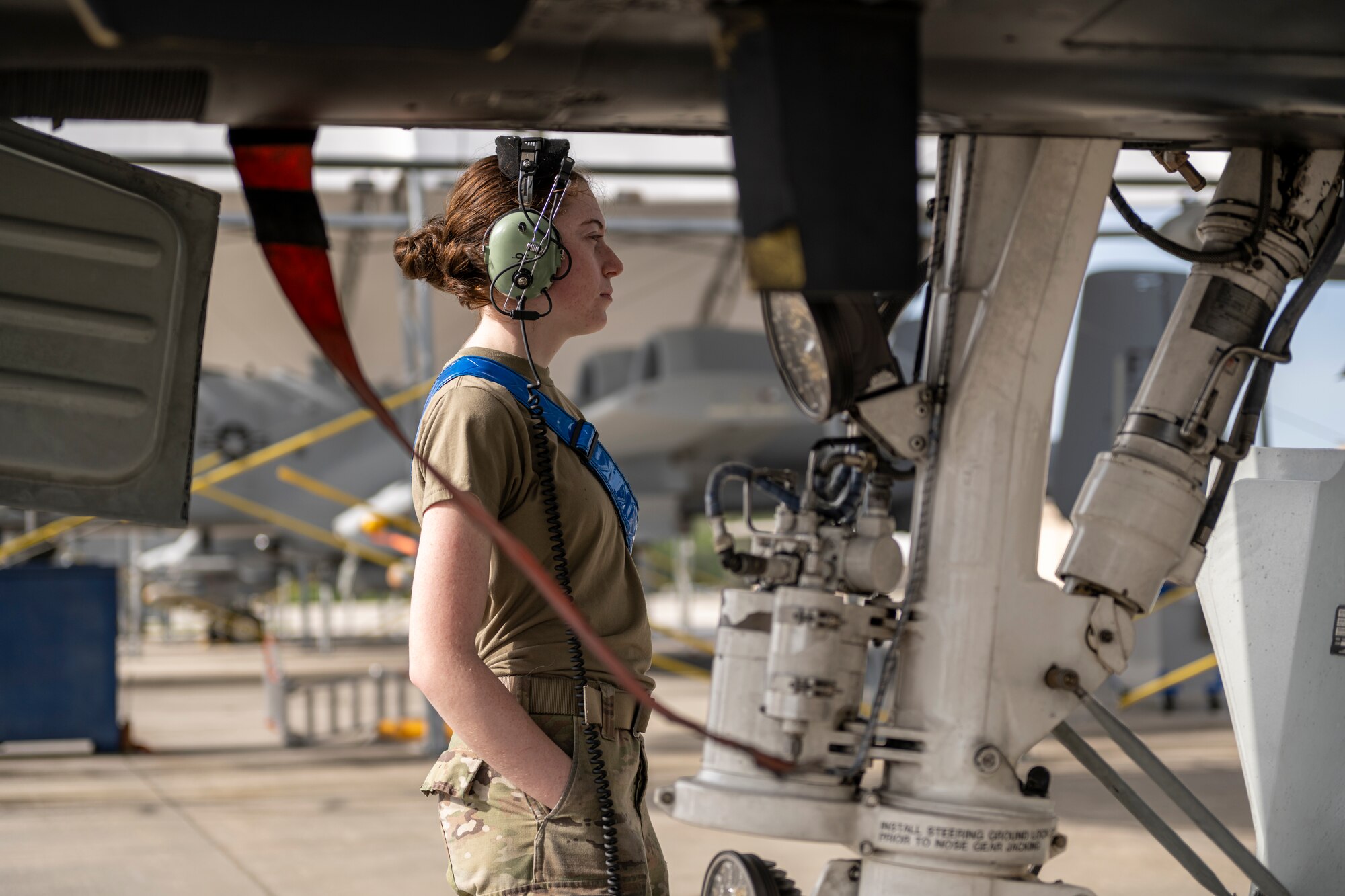 U.S. Air Force Airman Gabrielle Shipley, 74th Fighter Generation Squadron crew chief, prepares an A-10C Thunderbolt II to launch during Exercise Ready Tiger 24-1 from Moody Air Force Base, Georgia, April 10, 2024. The A-10 is designed for close air support of ground forces. The Ready Tiger 24-1 exercise evaluators will assess the 23rd Wing's proficiency in employing decentralized command and control to fulfill air tasking orders across geographically dispersed areas amid communication challenges. (U.S. Air Force photo by Senior Airman Deanna Muir)